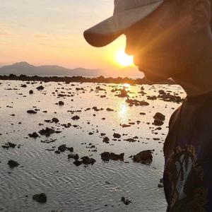 三亚赶海小七头像